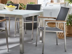 Gartenmöbel Set Glasplatte Schwarz 180 X 90 Cm 6-Sitzer Stühle Textilbespannung Schwarz Grosseto
